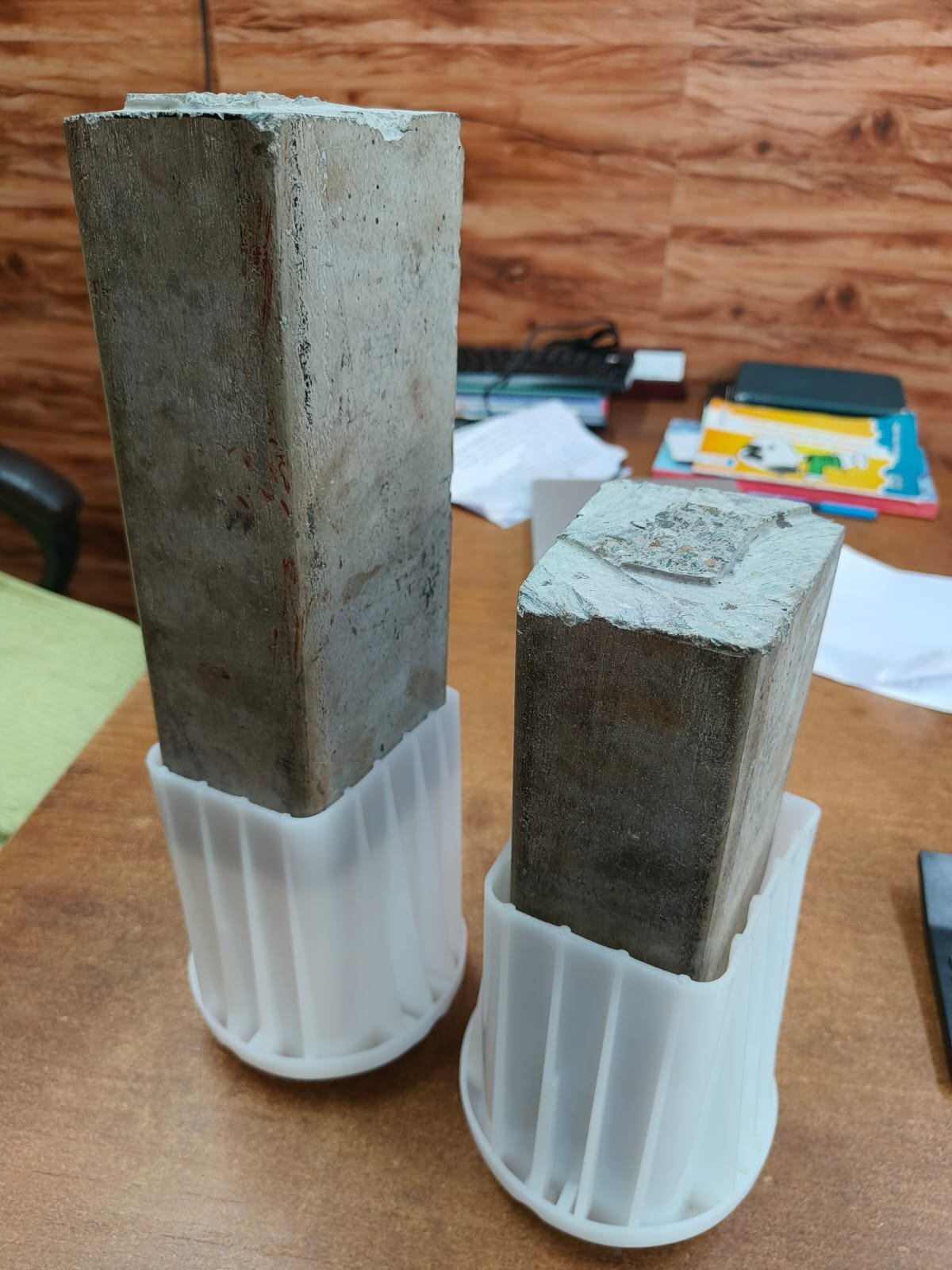 Concrete pole caps installed on two RCC posts
